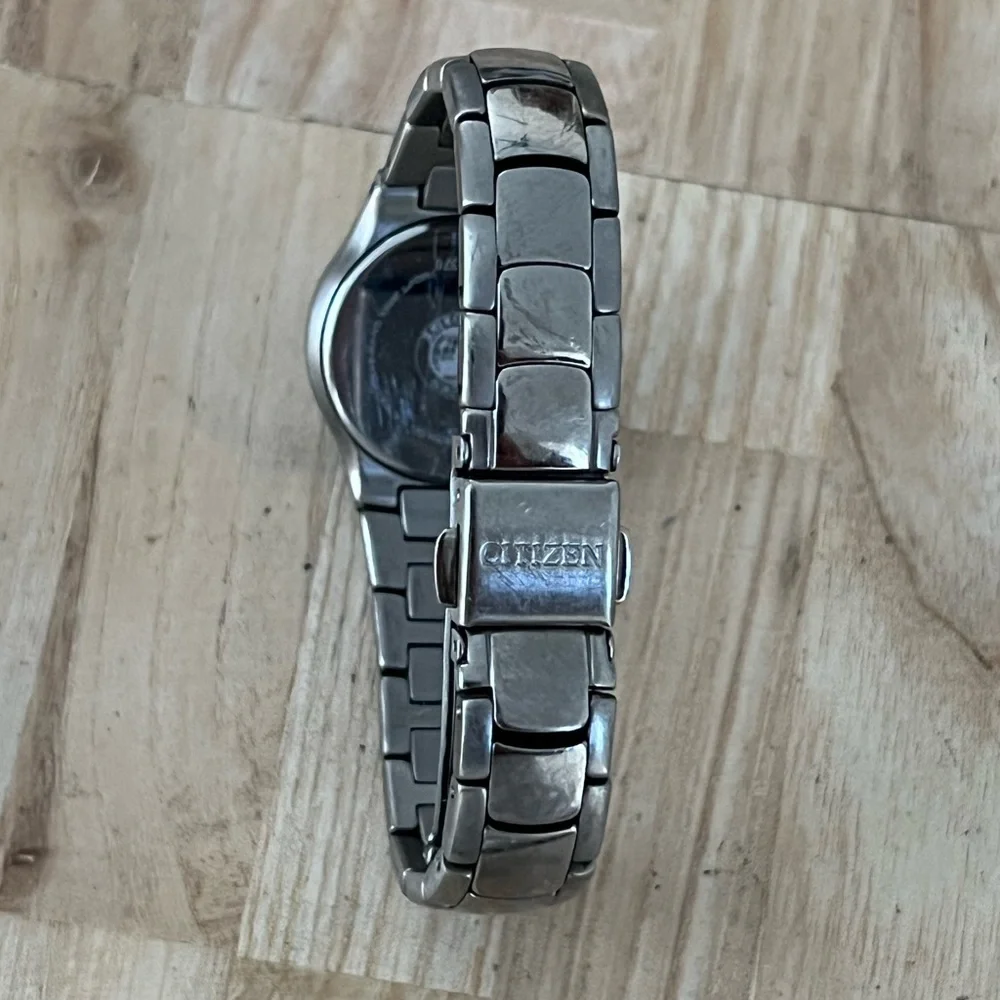 Citizen Eco-Drive Titanium Solar Black Dial Day Date Window Titanium Bracelet